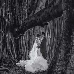 Bride and groom in the woods by Porfyri Photography
