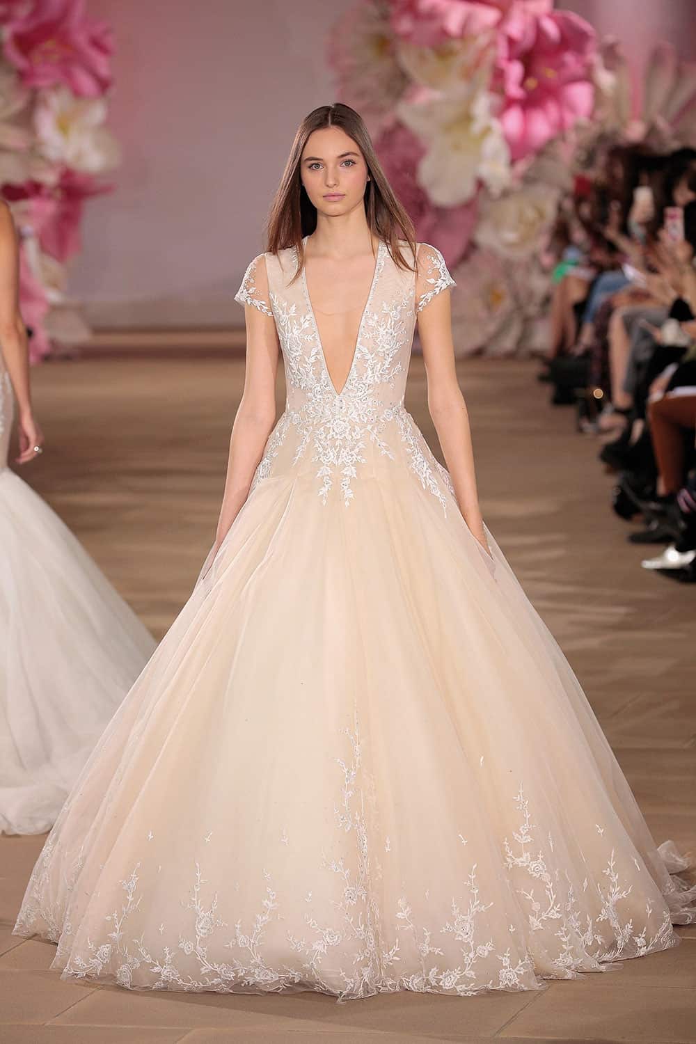 Pink wedding dresses: Plunge neckline blush wedding gown by Ines Di Santo