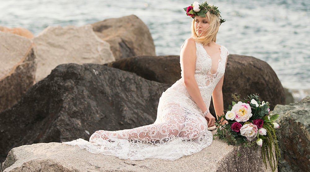 Amoresque lace wedding gown with sheer V neckline.