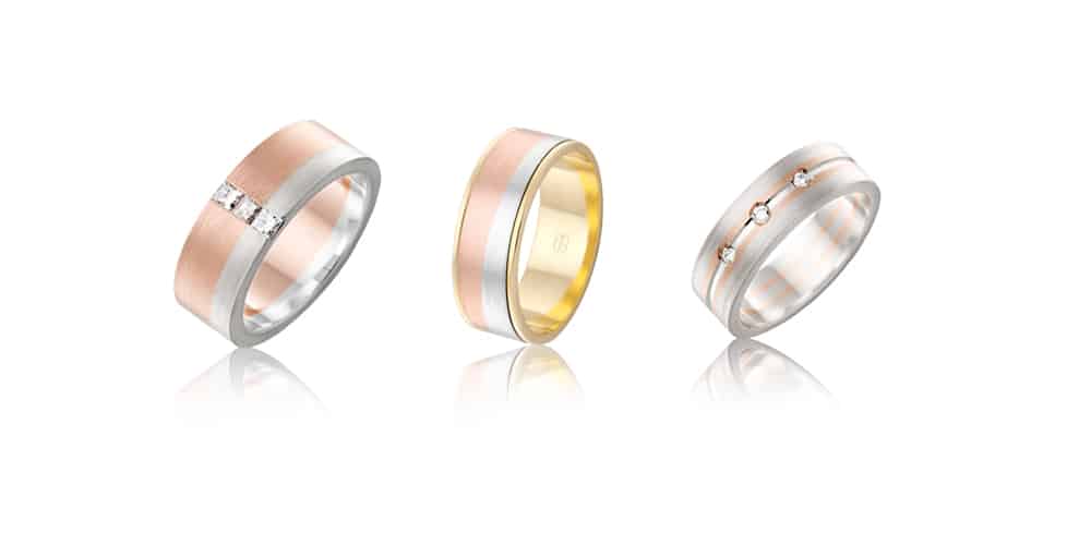 Rose gold, gold + silver mixed metal wedding bands with diamonds