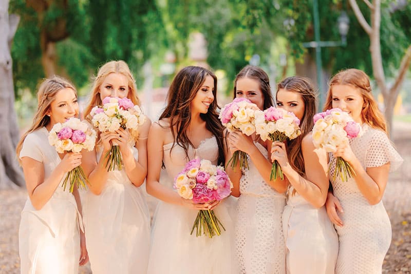 Bridetribe with their pink and cream bouquets. Photo: Evernew Studio