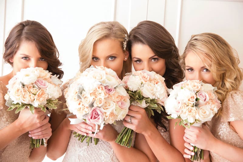 Bridetribe with their pastel-hued bouquets. Photo: Milque