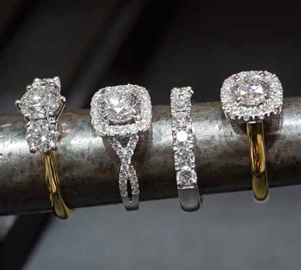 4 different diamond engagement rings from Xennox Diamonds