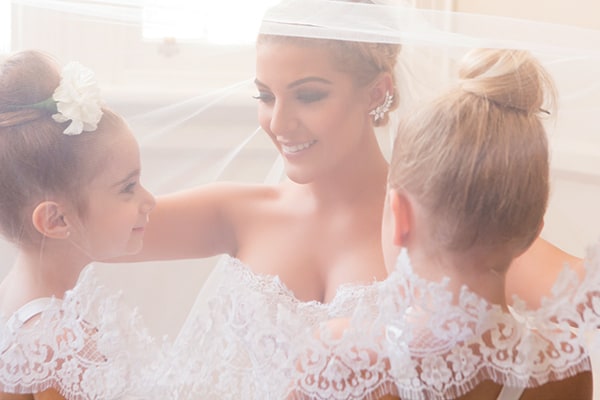 Bride and her flower girls by Milque Photography