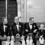 Groom and groomsmen in traditional Scottish kilts photographed by Christopher Thomas Photography.