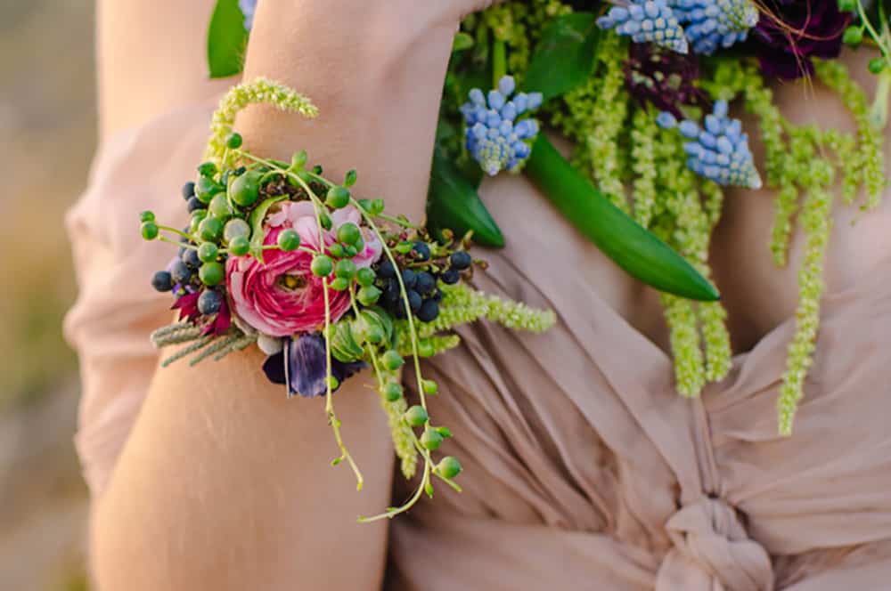 Floral corsage and necklace by Rebecca Raymond Florals. Photo: Amanda Dumouchelle Photography