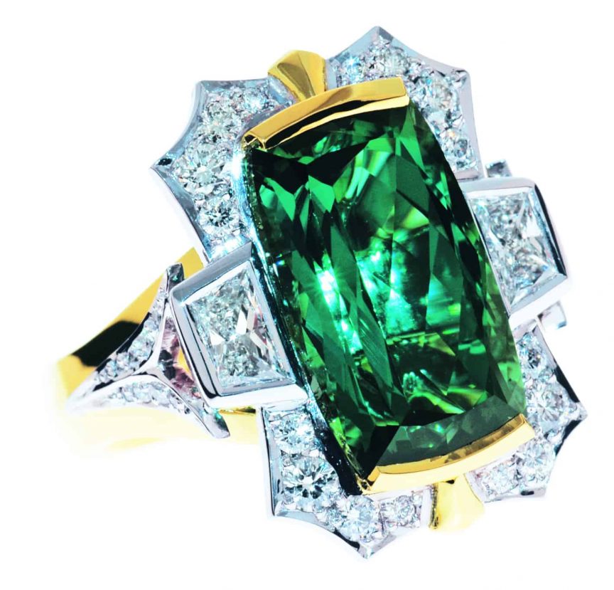 Diamond ring with emerald stone