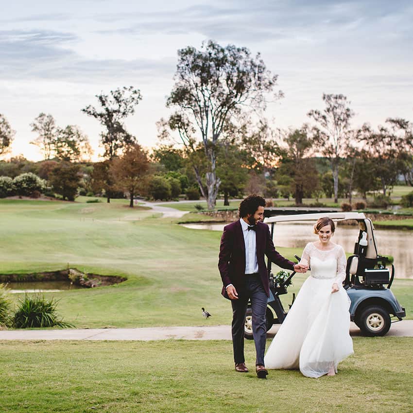 Bride and groom on the golf course