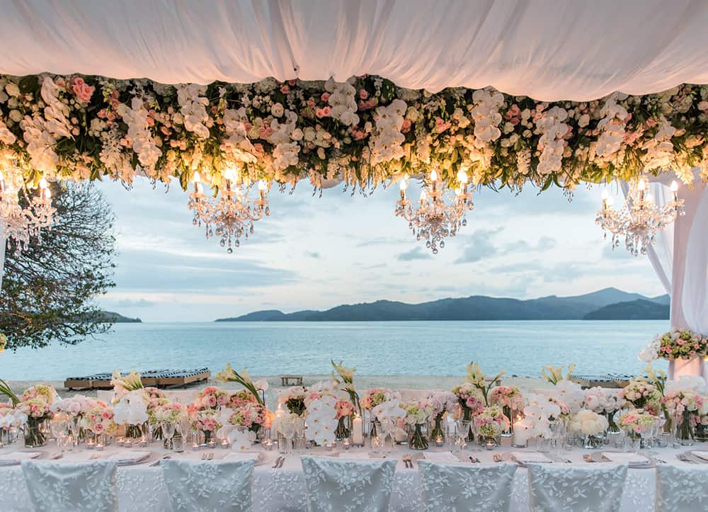 Wedding florals at a seaside reception