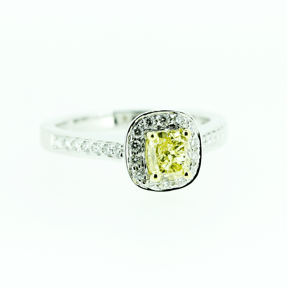 Pillow shaped diamond ring with yellow diamond