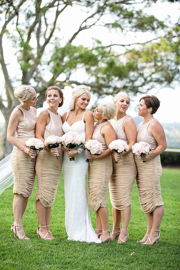 bride and bridesmaids wearing champagne colour dresses