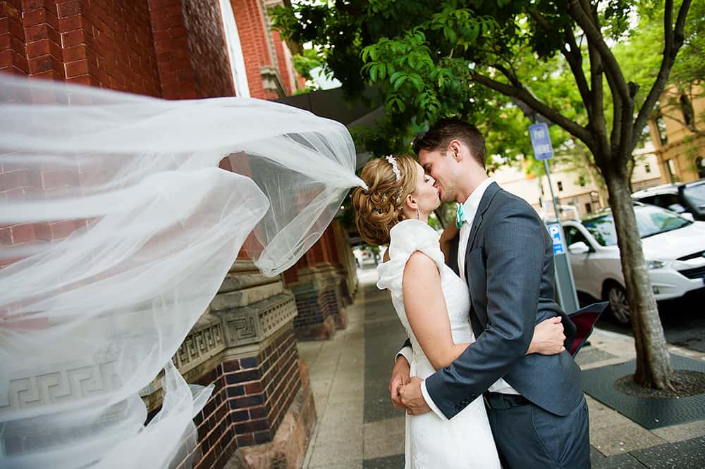 wedding couple kissing by Christopher Thomas Photography