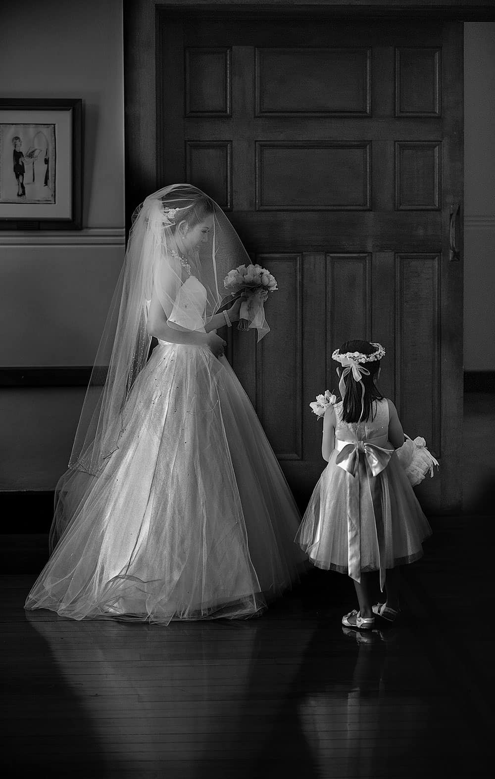 Bride and flower girl image by Christopher Thomas Photography