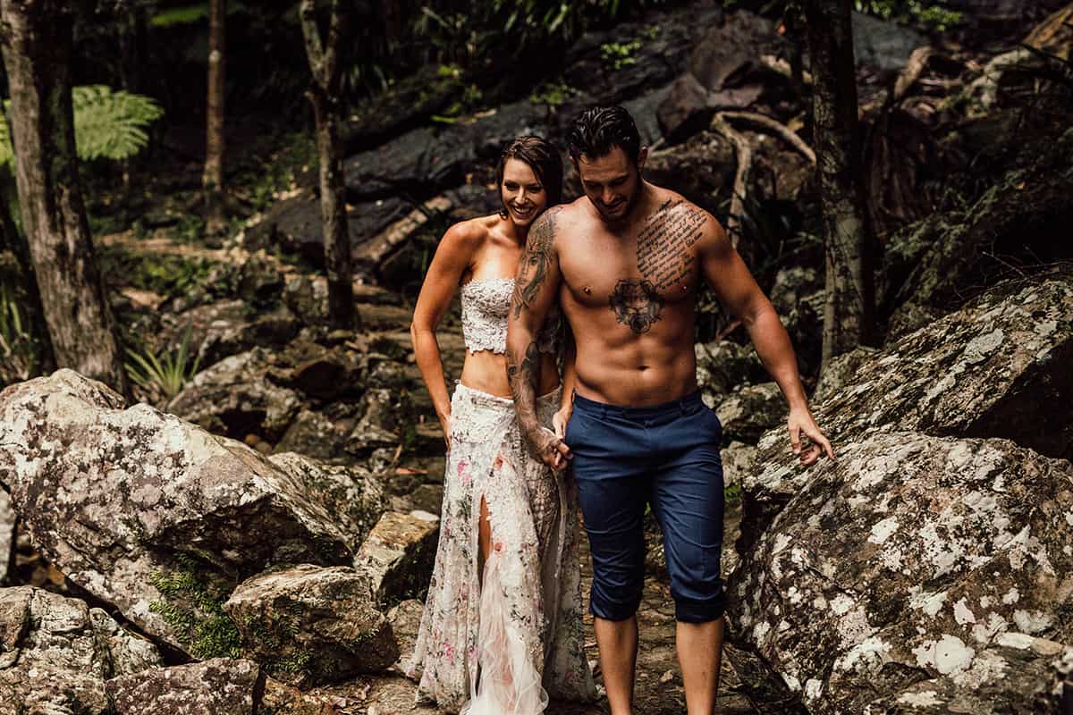 Couple walking in rainforest