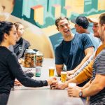 Balter-Brewing-Currumbin-men-talking-and-drinking-beer-at-the-bar