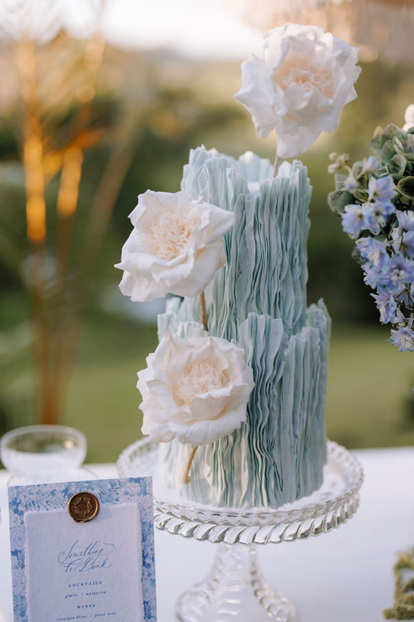 blue wedding cake white wedding styling